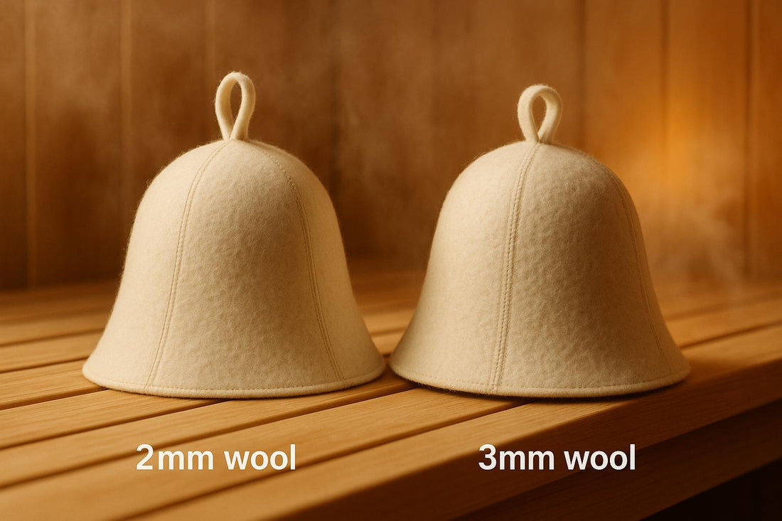 Two ivory wool felt sauna hats on a cedar bench showing thickness comparison — 2mm wool on the left, 3mm wool on the right