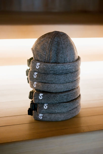 Schvitzin premium American merino wool sauna hats stacked, adjustable buckle, handmade in New Jersey